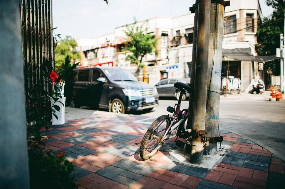 Free Image of Bicycle Parked on Side of Road 