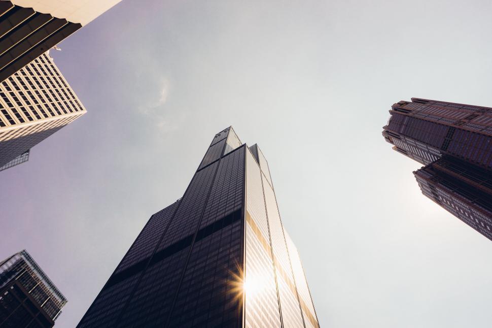 Free Image of Looking Up at Tall Buildings in a City 