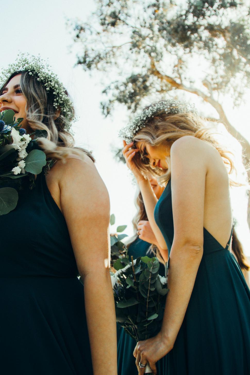 Free Image of Two Women Standing Together in Urban Setting 