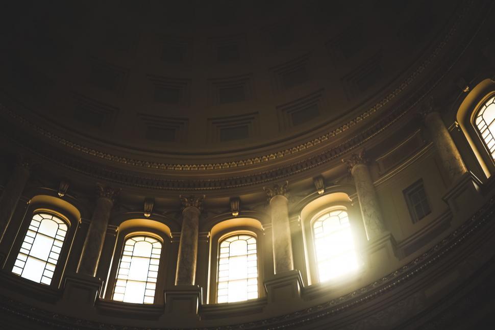 Free Image of Sunlight Shining Through Windows of Building 