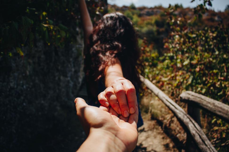 Free Image of Person Holding Hand Up in the Air 