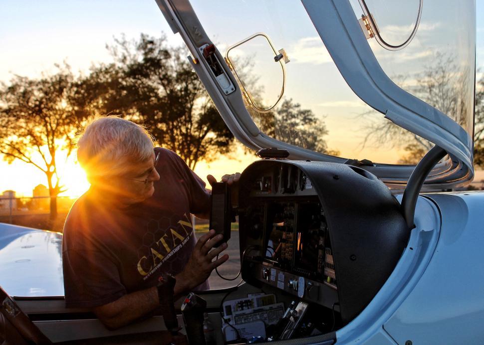 Free Image of Man Sitting in Cockpit of Plane 