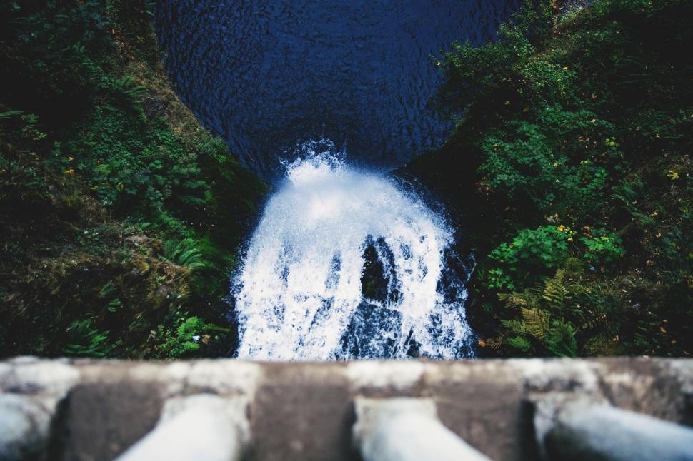 Free Image of A Panoramic View of a Waterfall From Above 