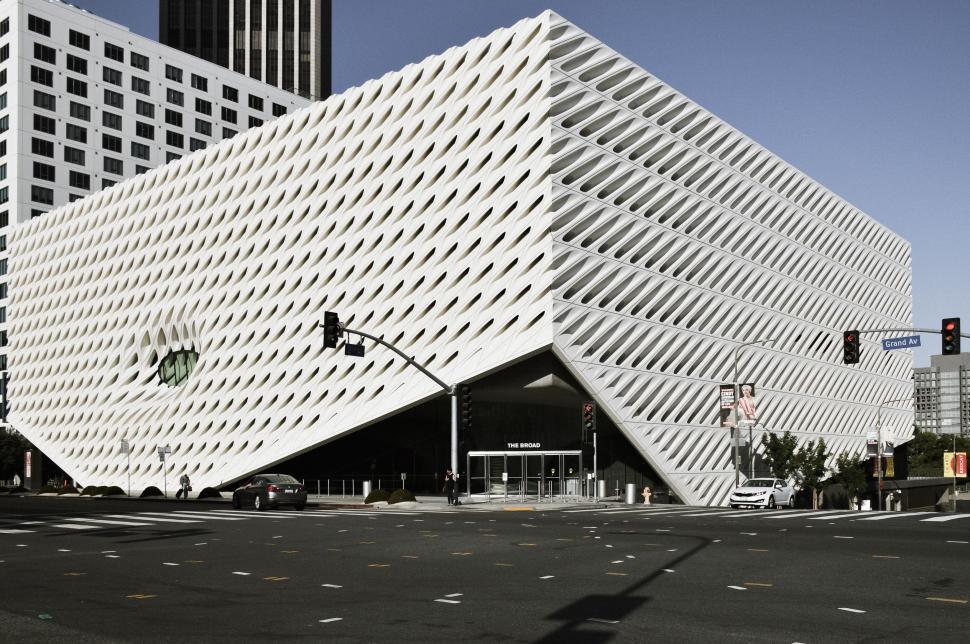 Free Image of Large White Building Alongside Road 