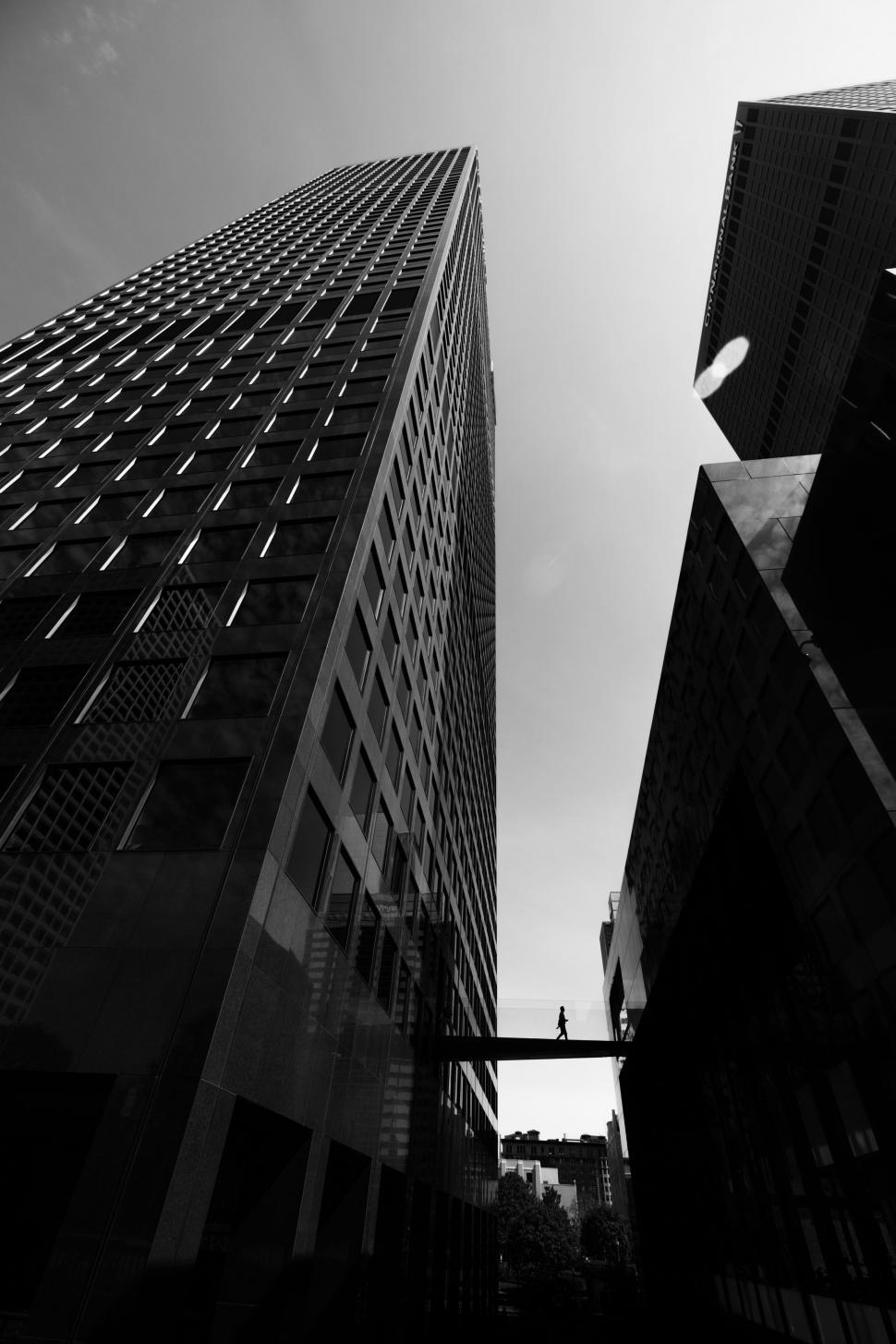Free Image of Two Tall Buildings in Black and White 