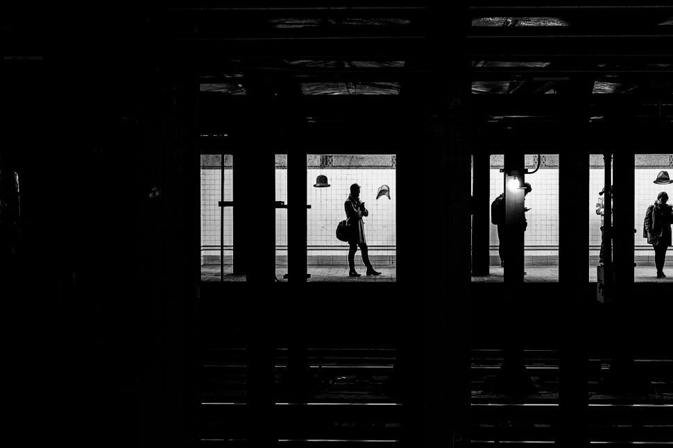 Free Image of People Walking in a Building 