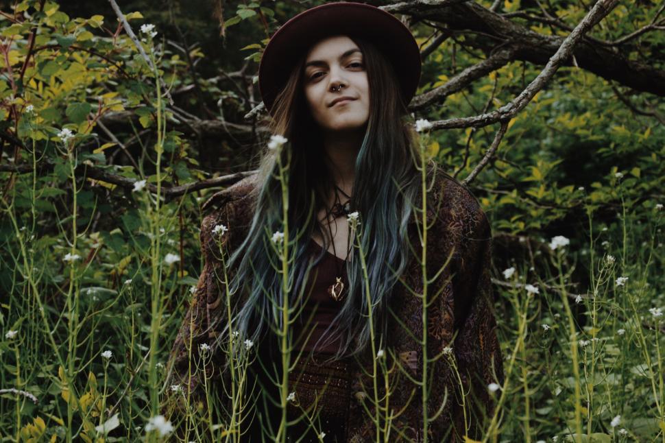 Free Image of Woman Standing in Tall Grass 