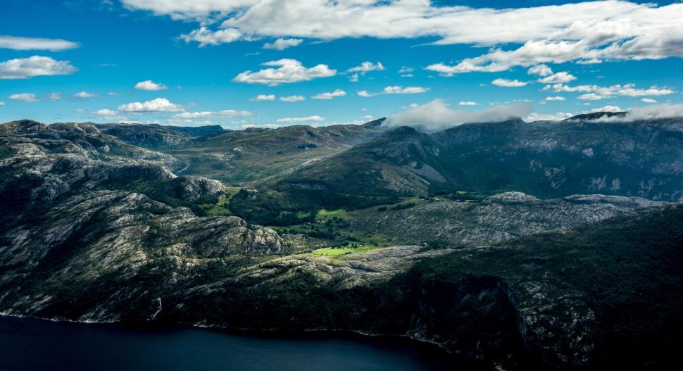 Free Image of Majestic Mountain Range With Waterfront View 