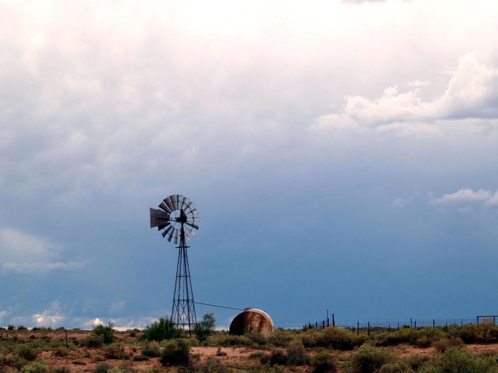 Free Image of Windmill Standing in Field 