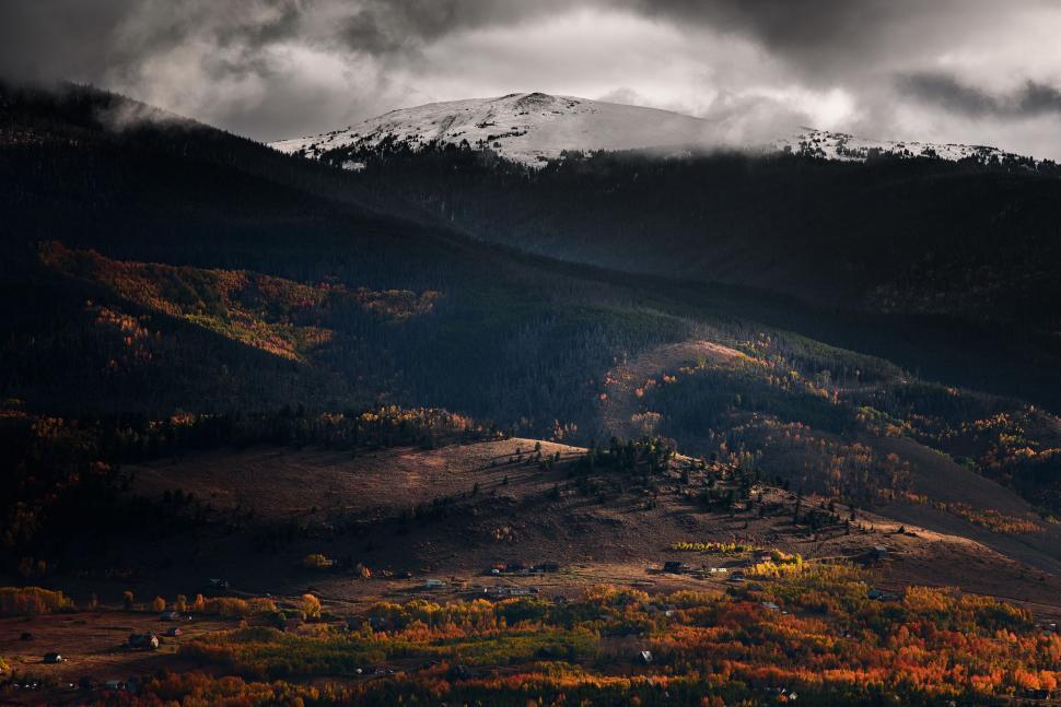 Free Image of Majestic Mountain Range With Clouds in the Sky 