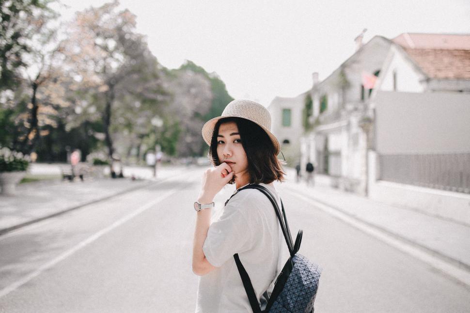 Free Image of Woman Standing on Side of Road 