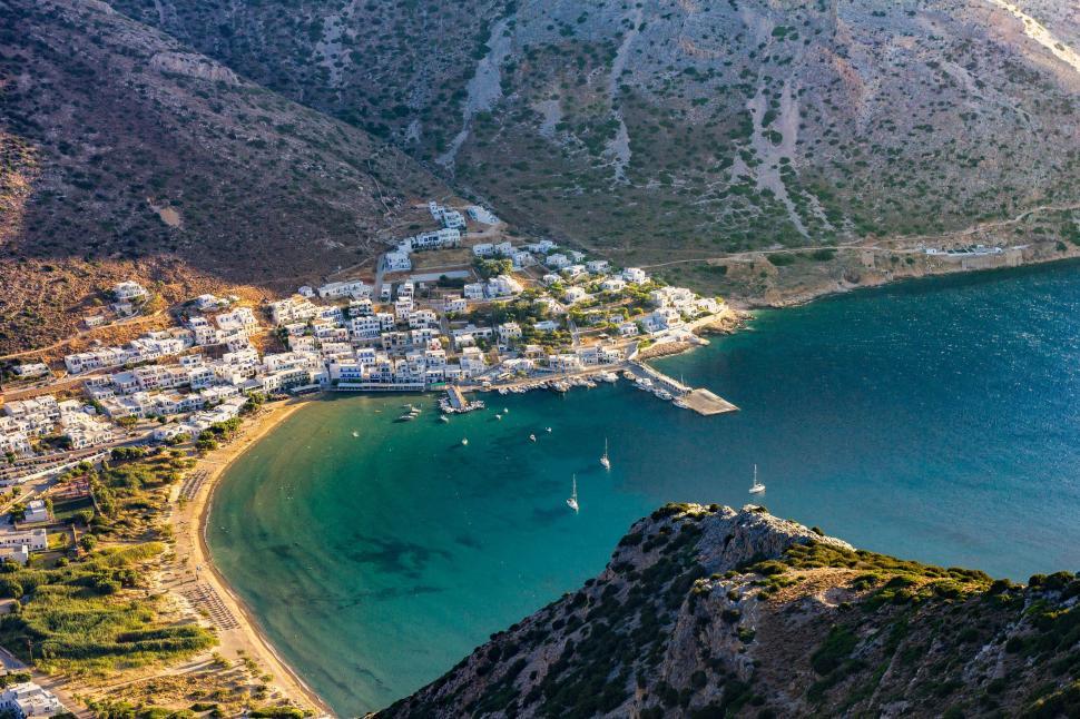 Free Image of Aerial View of Small Town and Body of Water 
