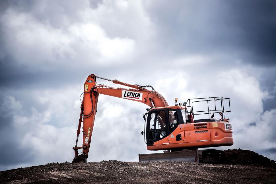 Free Image of Orange Excavator on Hill 