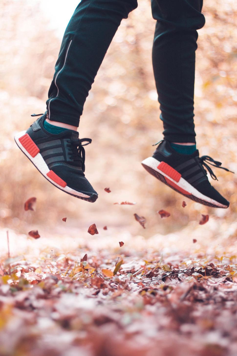 Free Image of Person Jumping in the Air With Feet Raised 