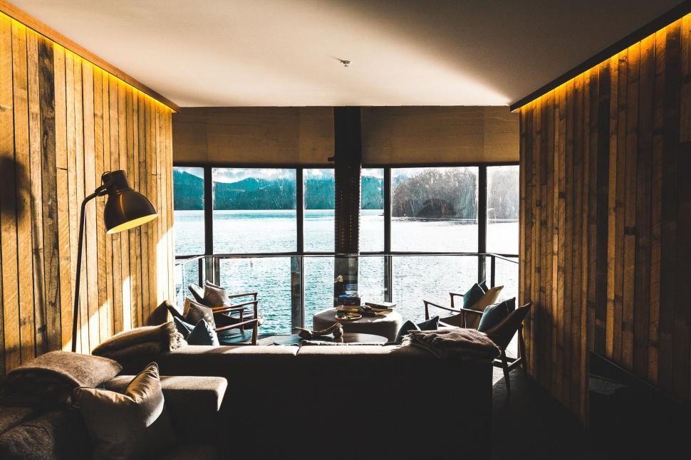 Free Image of Living Room With Furniture Next to Window 
