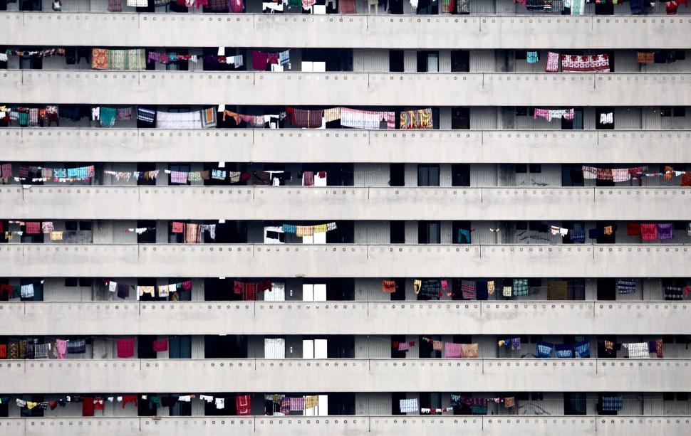Free Image of Clothes Drying Outdoors on Building Rooftop 