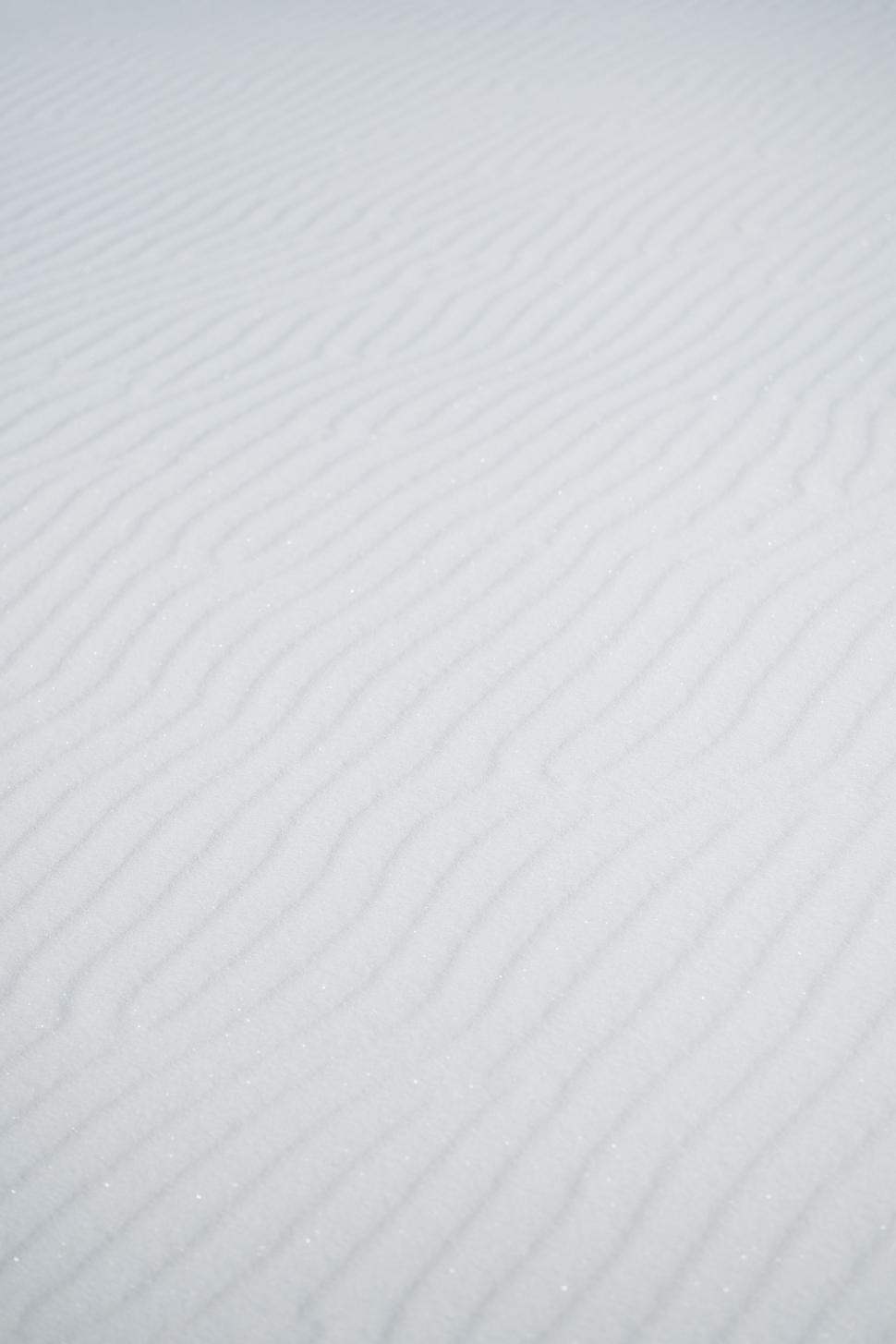 Free Image of Person Skiing Down Snow Covered Slope 