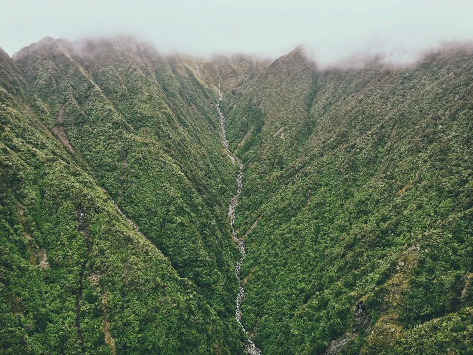Free Image of Majestic Mountain Overlooking River Below 