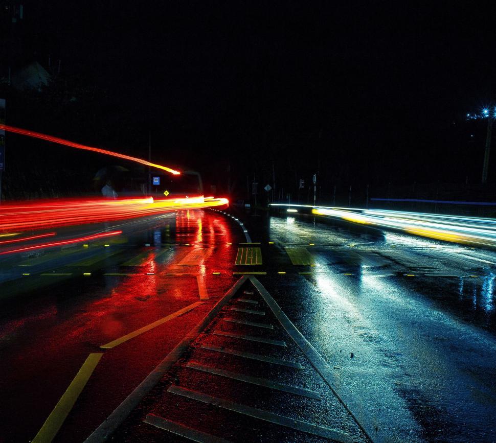 Free Image of Busy City Street at Night With Traffic Lights 
