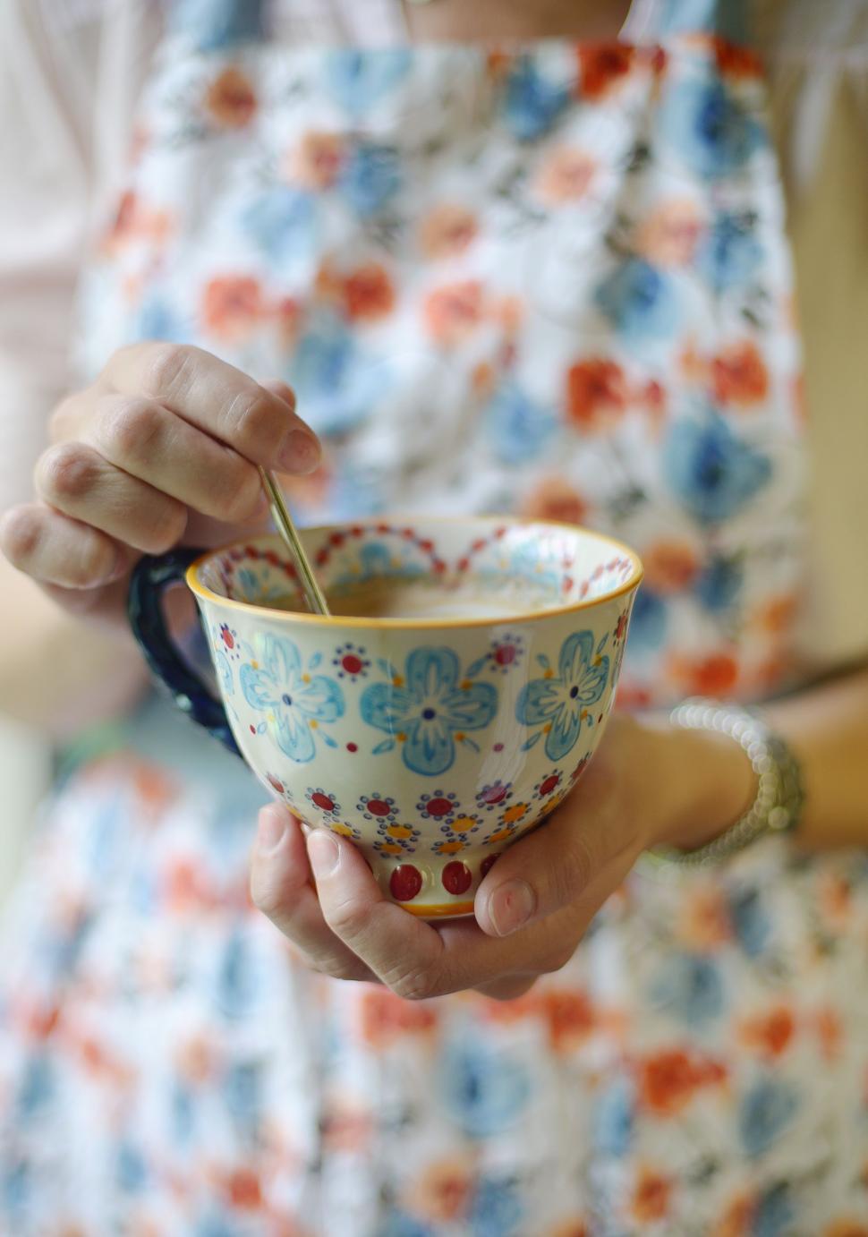 Free Image of Person Holding Bowl With Spoon 