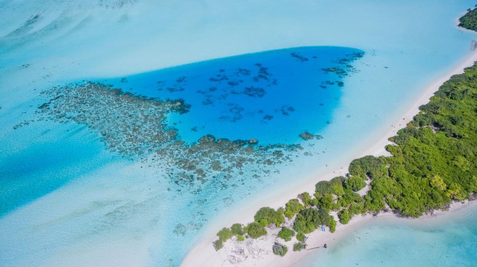 Free Image of Aerial View of a Blue Hole in the Water 