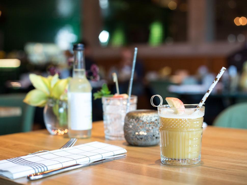 Free Image of Wooden Table With Glass of Drink 