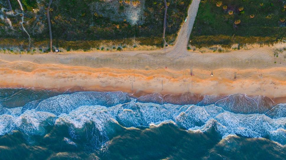Free Image of Aerial View of Sandy Beach and Ocean 