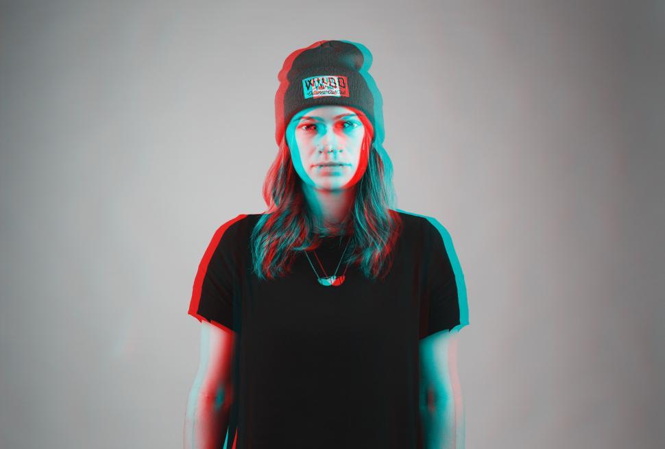 Free Image of Woman Wearing Hat and Black Shirt 