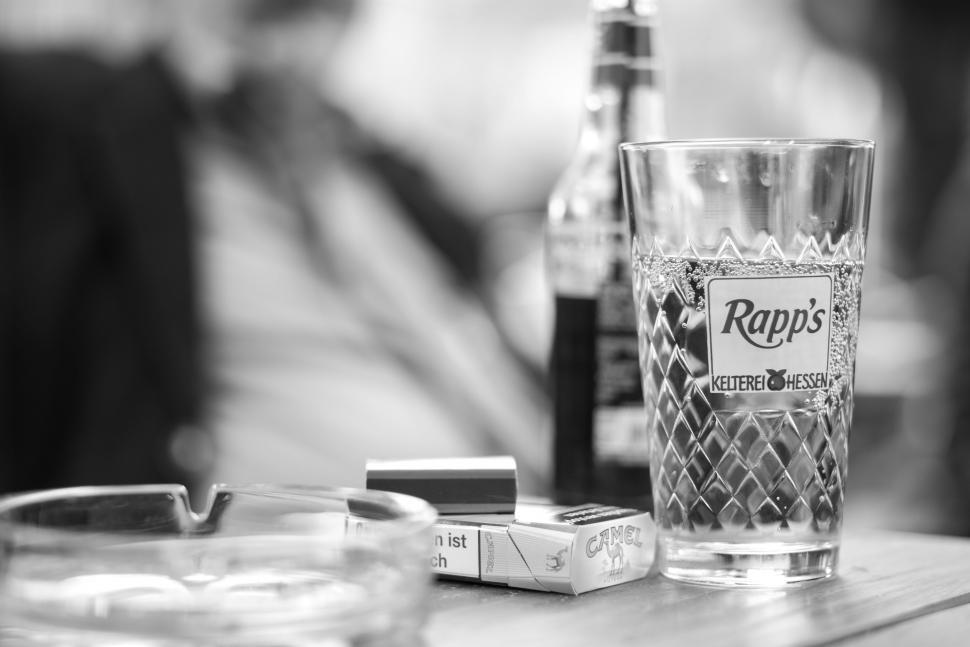 Free Image of Two Glasses on Wooden Table 
