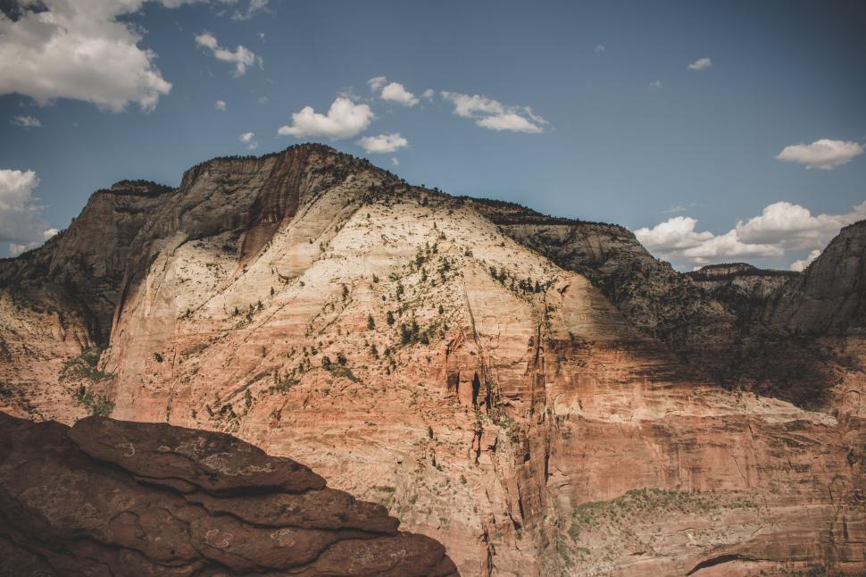 Free Image of Majestic Rocky Mountain Against Sky Background 