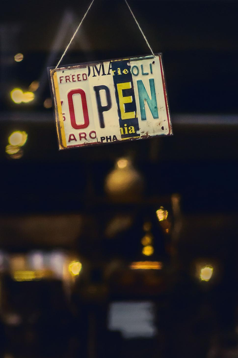 Free Image of Sign Hanging From the Ceiling of a Restaurant 