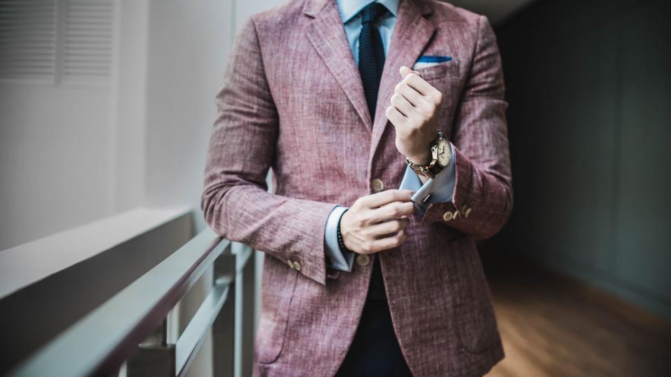 Free Image of Businessman Checking Time With Watch 