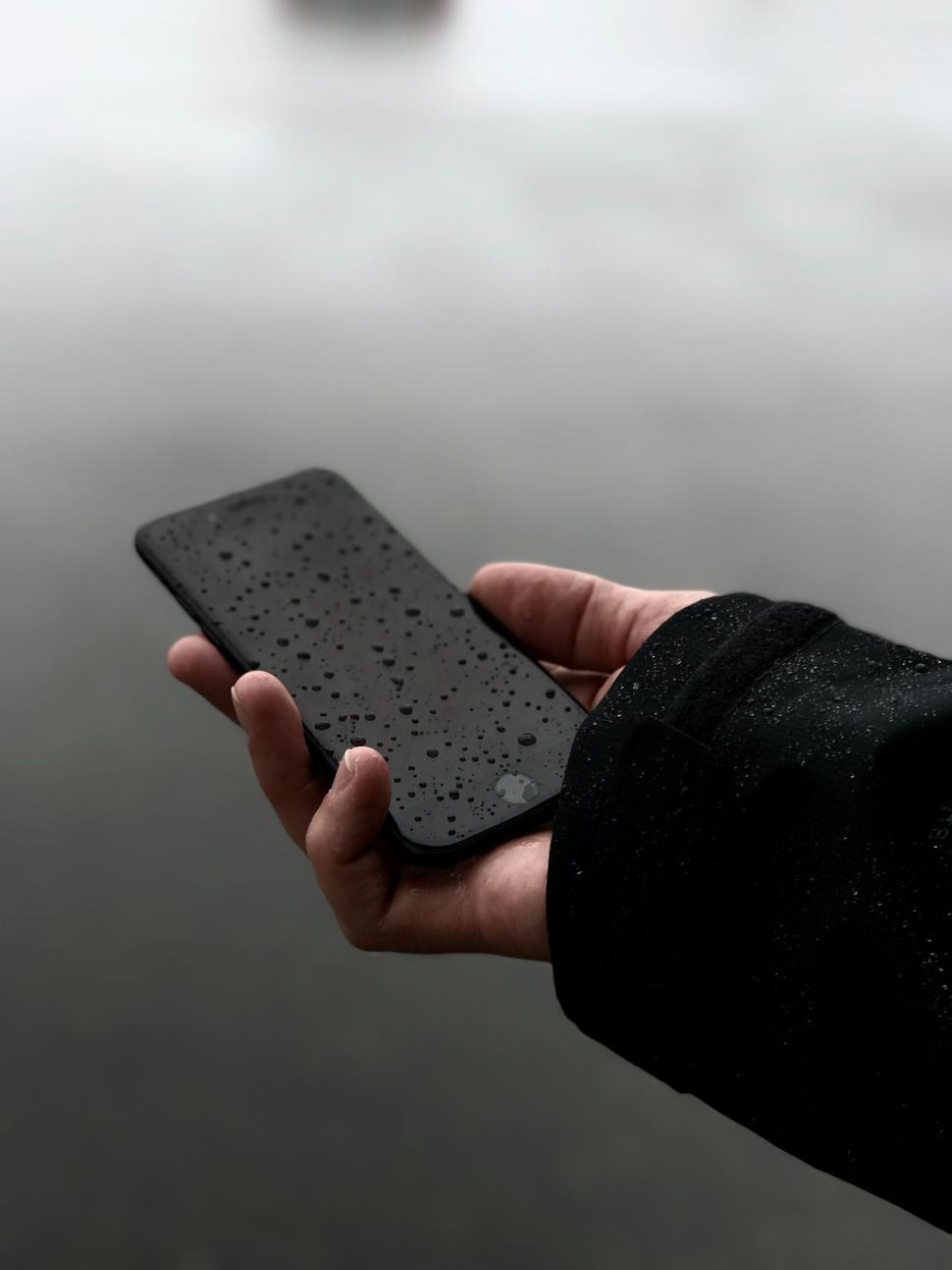 Free Image of Person Holding Cell Phone 