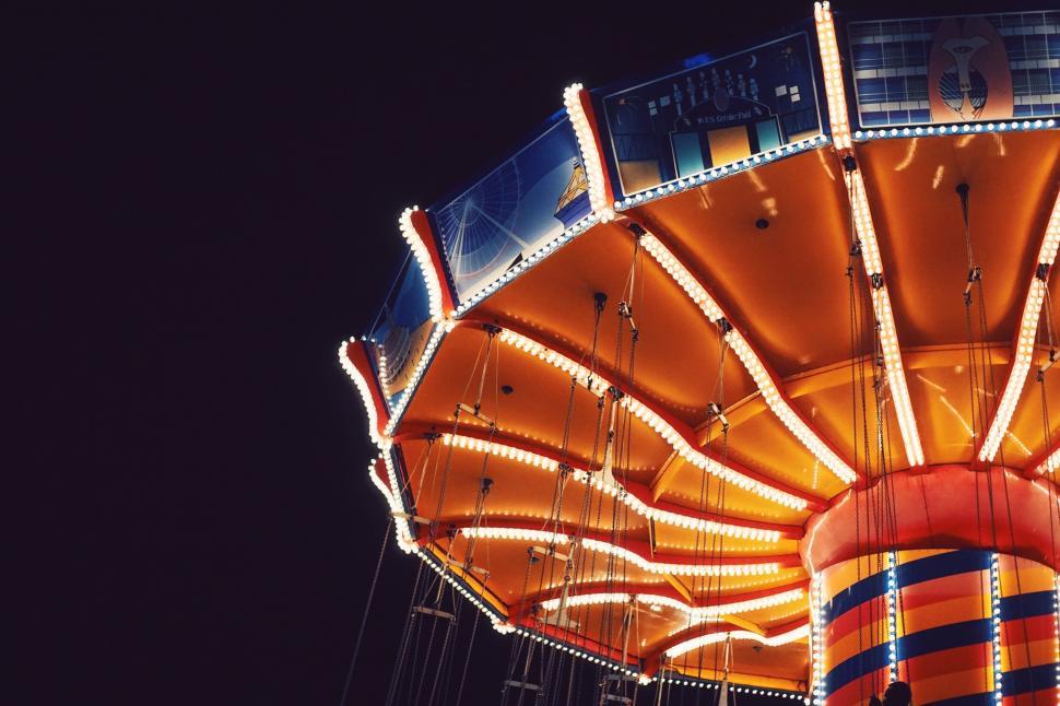 Free Image of Merry-Go-Round Illuminated at Night 