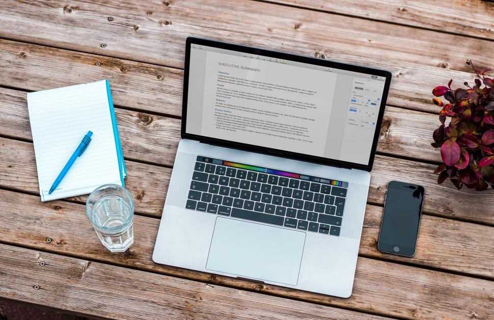 Free Image of Laptop Computer on Wooden Table 