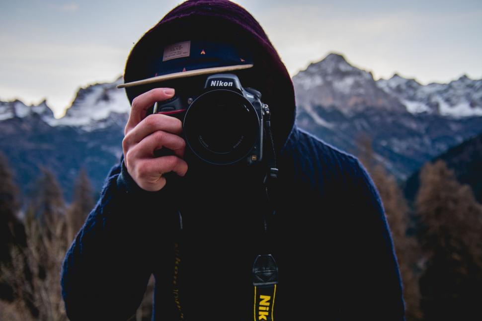 Free Image of Person Taking a Picture With a Camera 