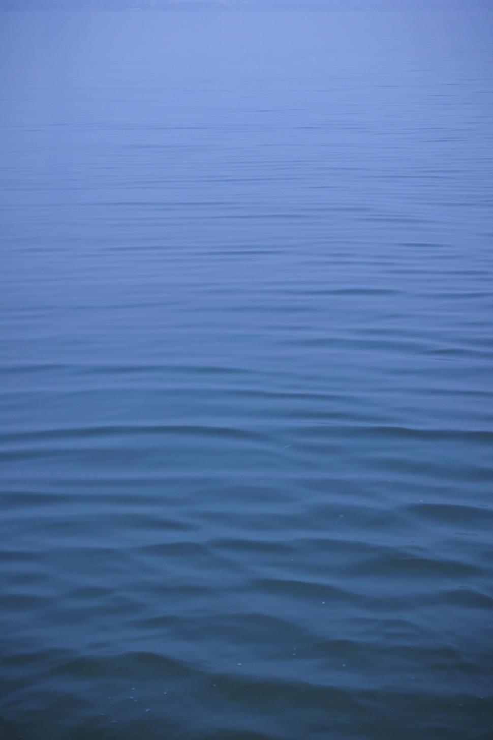 Free Image of Boat Floating on Large Body of Water 