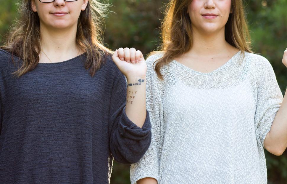 Free Image of Two Women Standing Together 