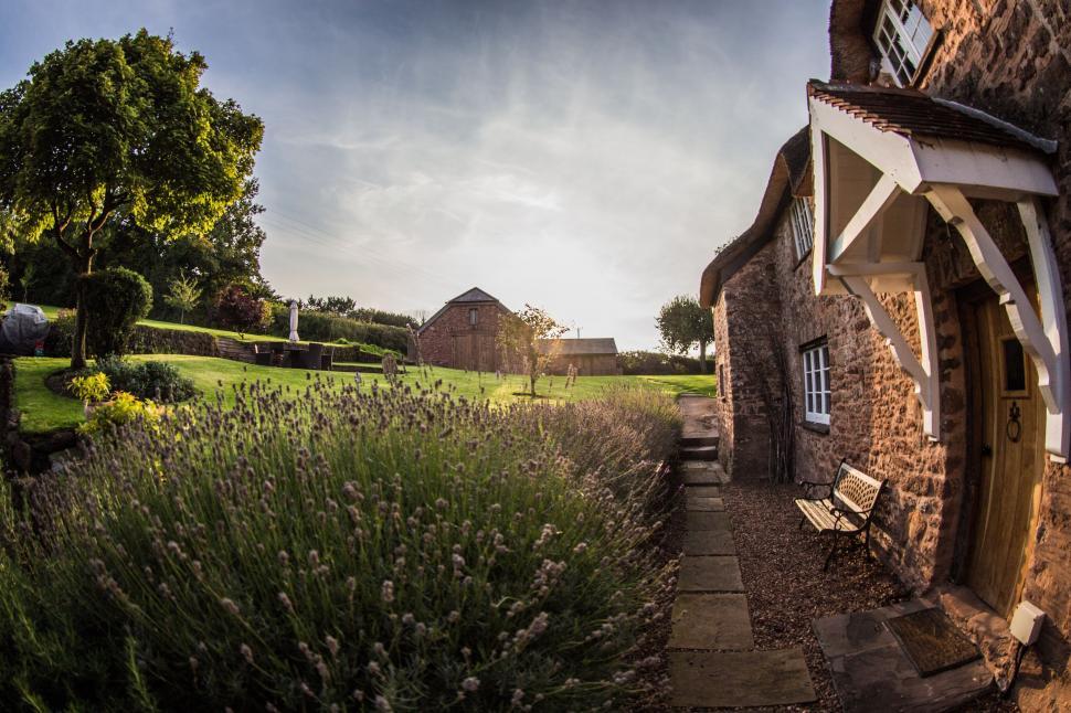 Free Image of Stone Building With Wooden Door and Window 