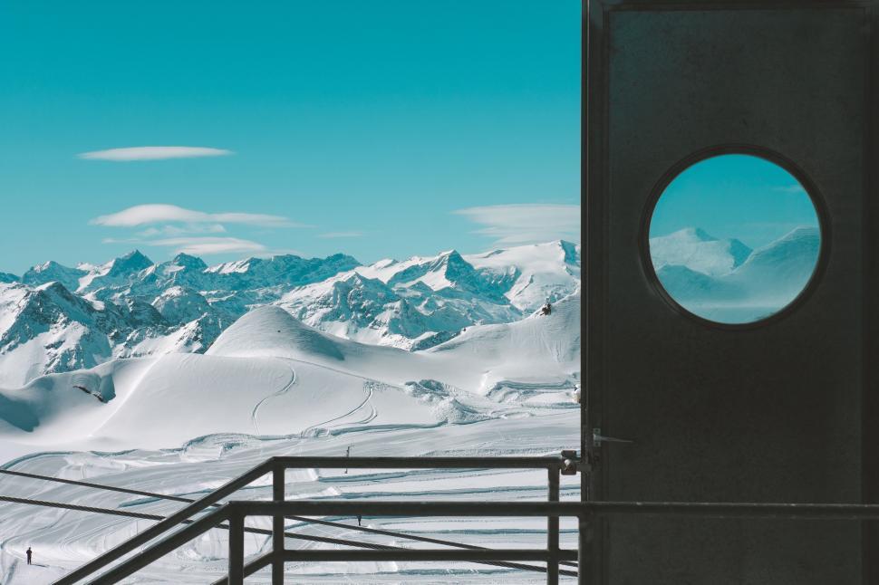 Free Image of Snowy Mountain With Clock Tower 