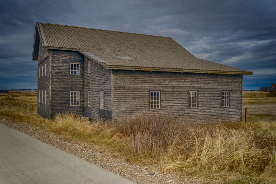 Free Image of Old Wooden Building Along Road 