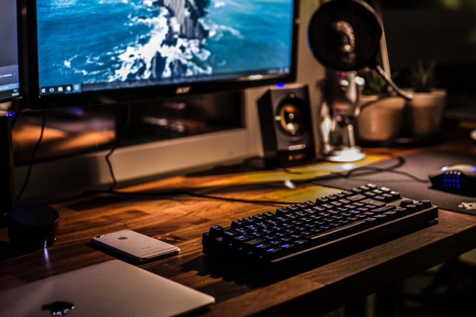 Free Image of Modern Computer Desk Setup With Keyboard, Mouse, and Monitor 
