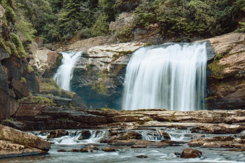 Free Image of Majestic Waterfall Overflowing With Water 