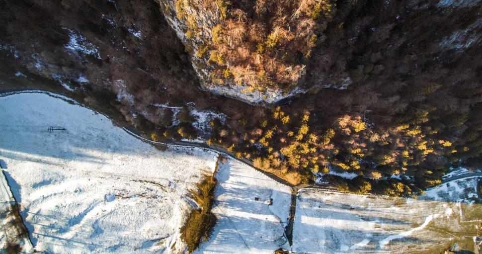 Free Image of Aerial View of Snow Covered Mountain 