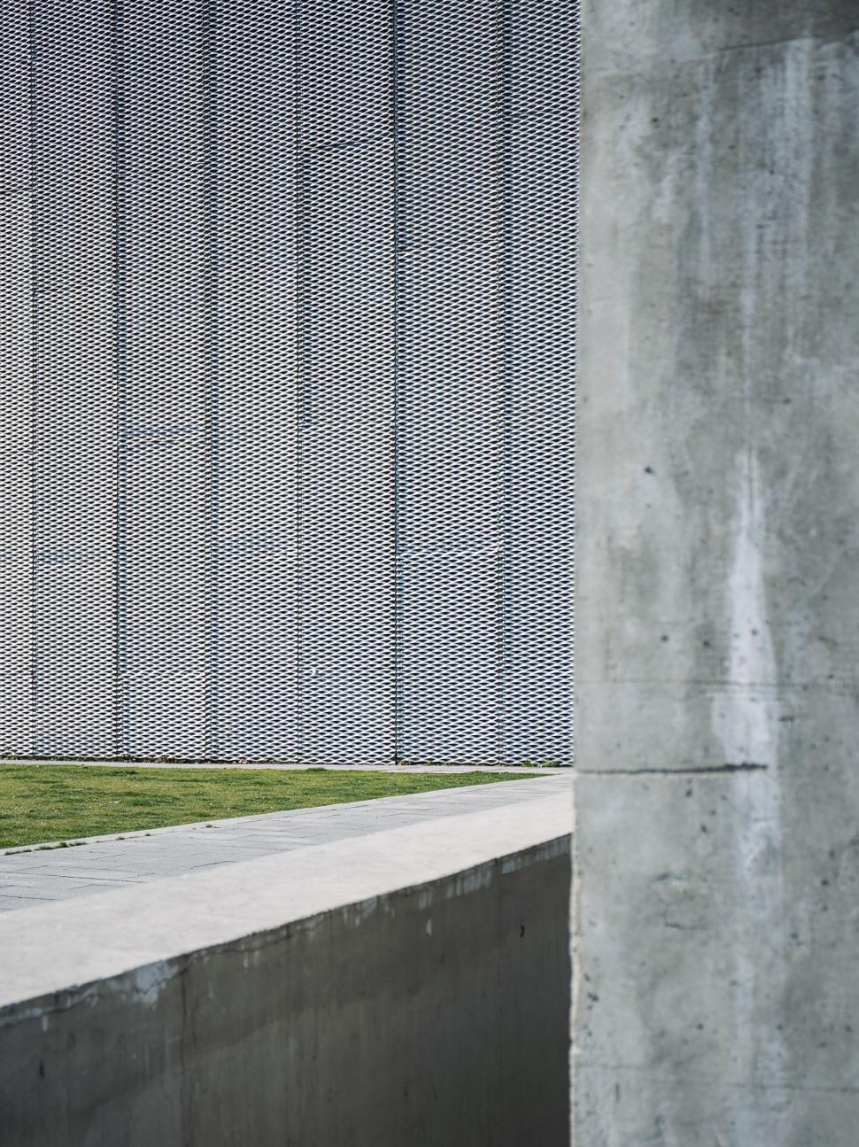 Free Image of Man Riding Skateboard Down Cement Ramp 