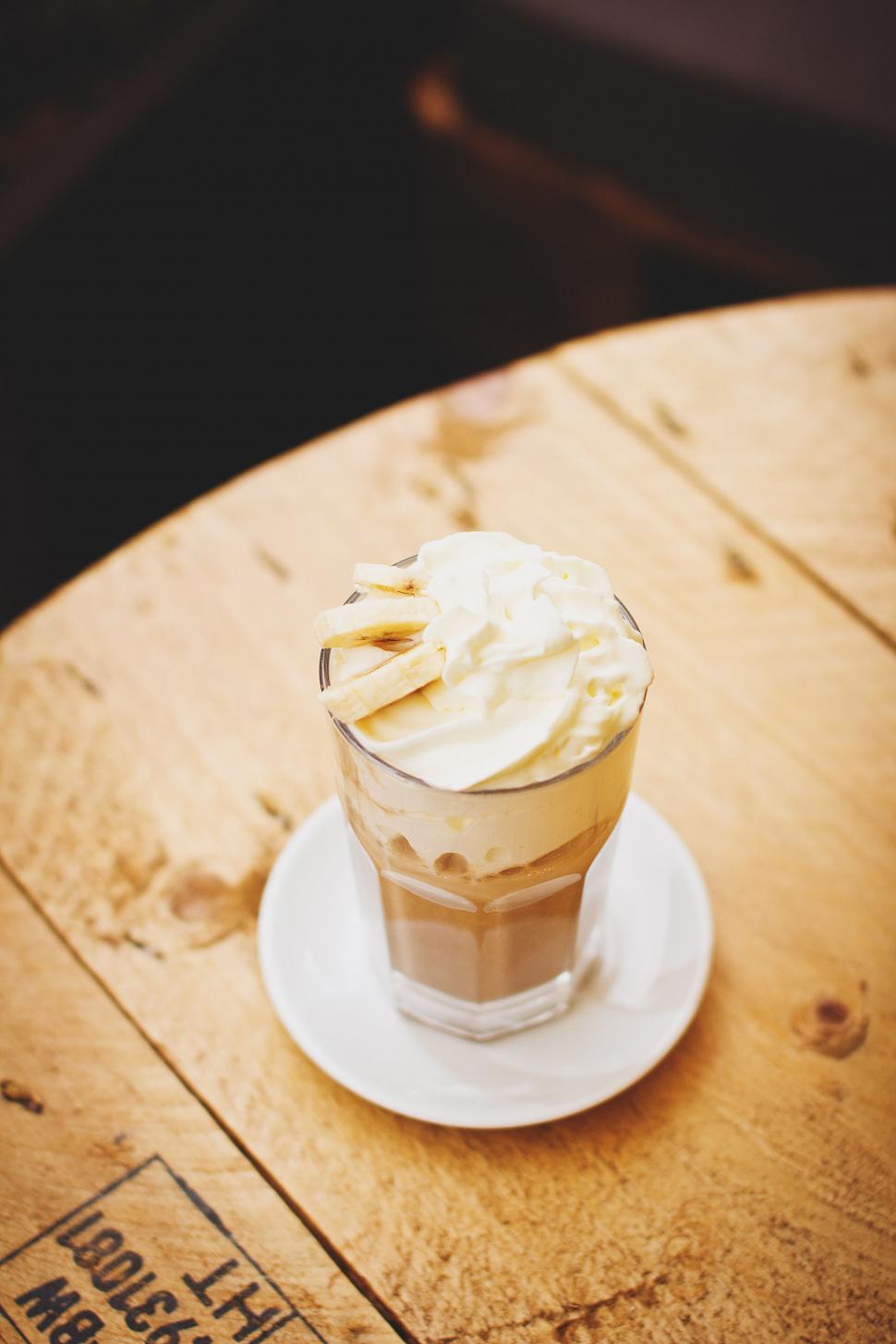 Free Image of A Cup of Coffee on a Wooden Table 