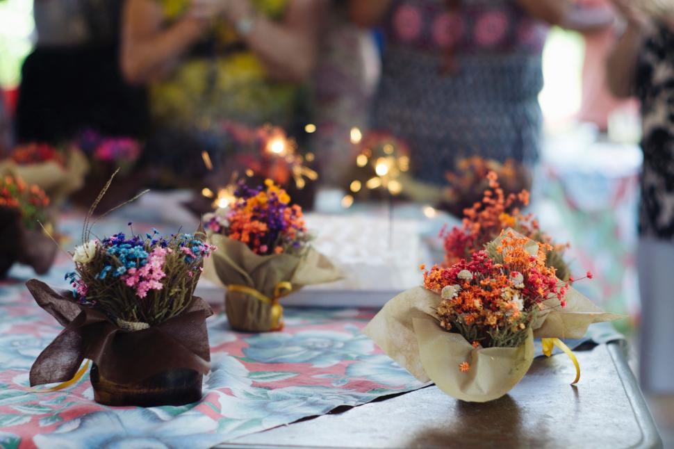 Free Image of Table With Vases of Flowers 