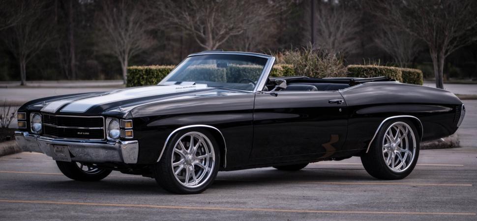 Free Image of Black Car Parked in a Parking Lot 