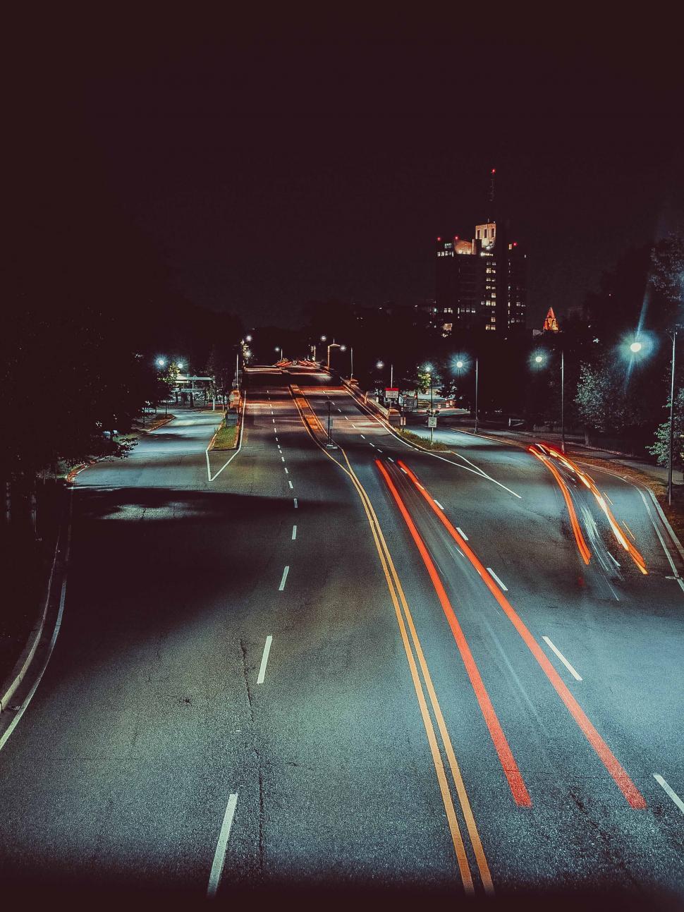 Free Image of City Street at Night With Street Lights 