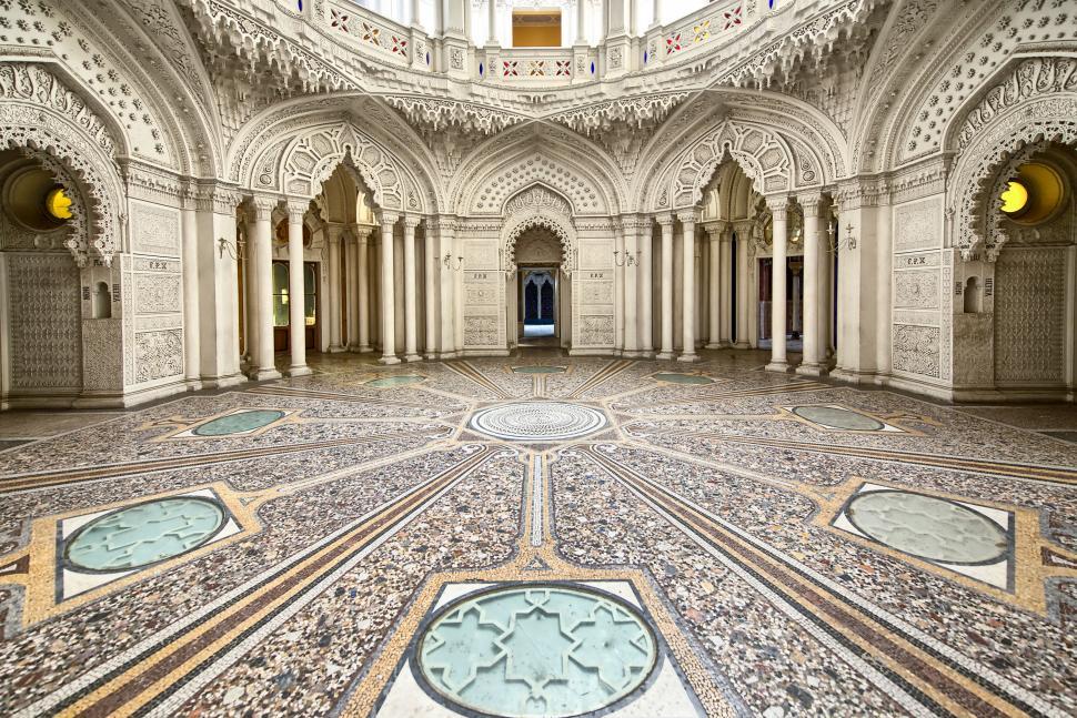 Free Image of Spacious Room With Circular Ceiling and Multiple Windows 